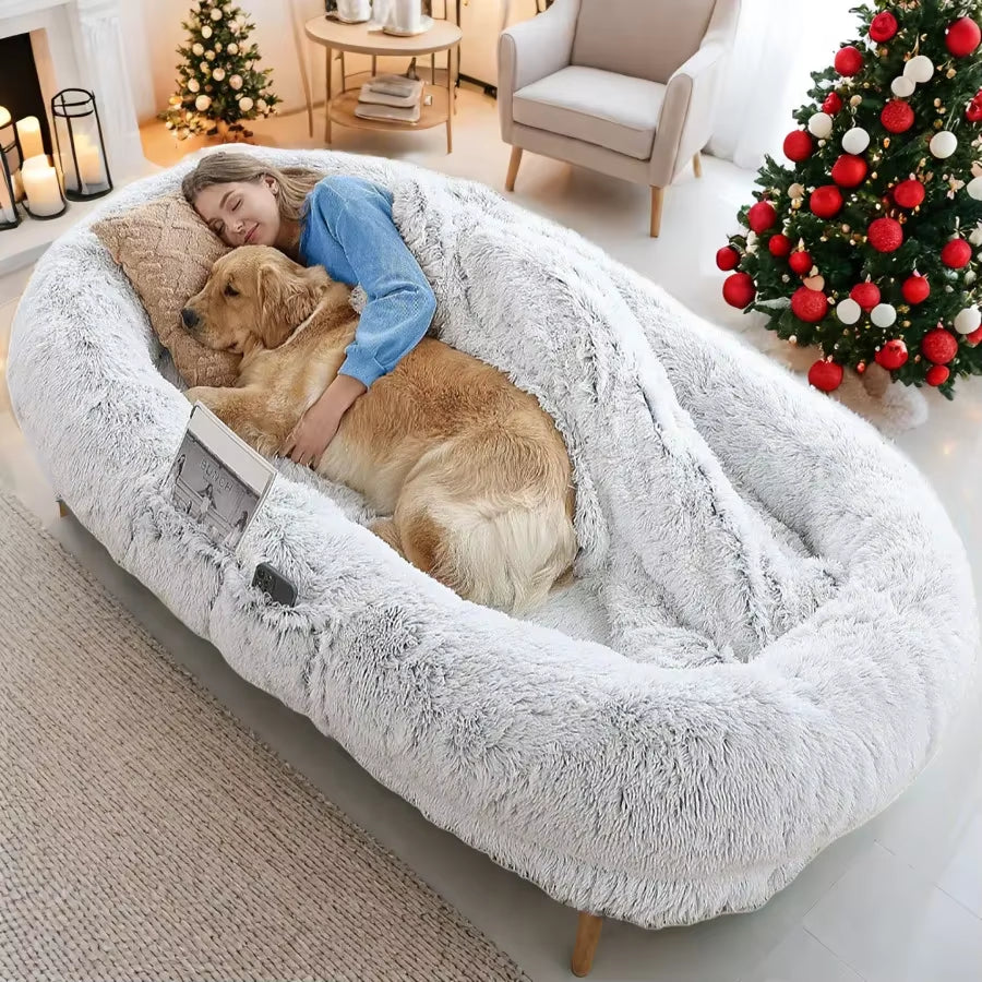 A Giant Plush Sponge Dog Bed for Human Use to Keep Warm in Winter as a Pet Bed. People and Dogs Share Leisure Mattresses